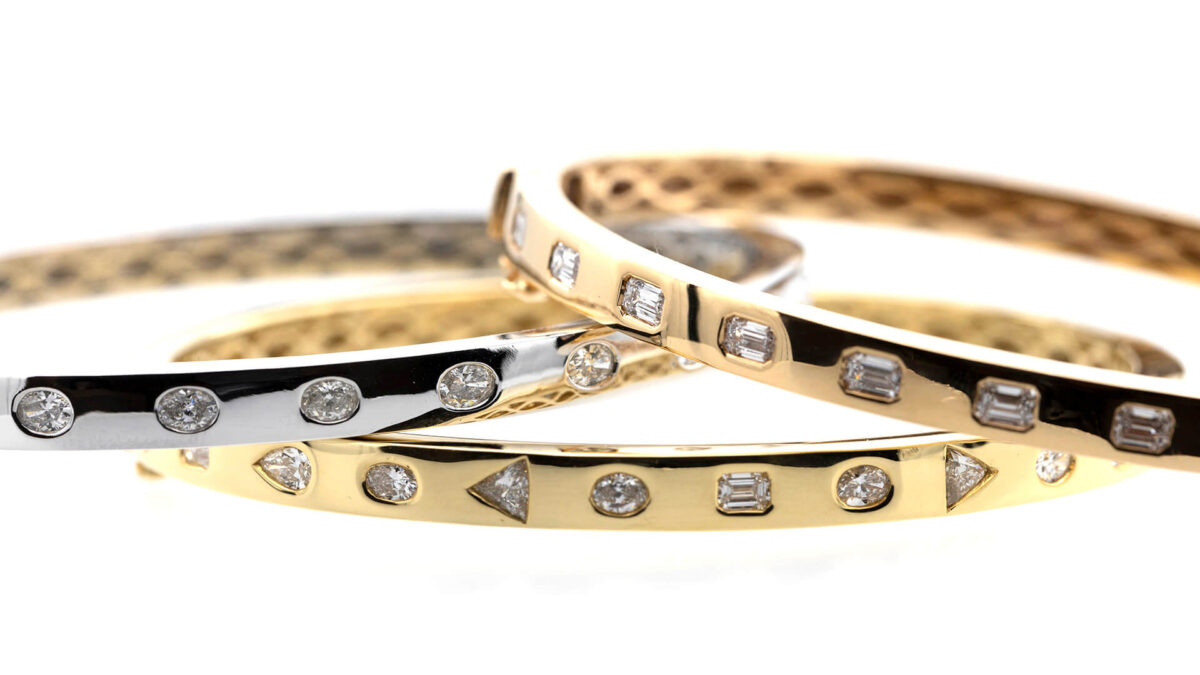 18KT Yellow Gold Cartier "Love" Bracelet with Diamonds