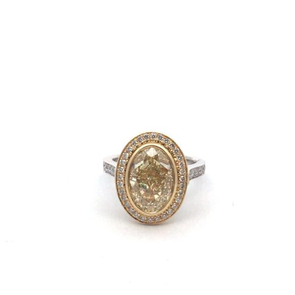5.02 Carat Oval Cut Fancy Light Yellow Diamond Ring